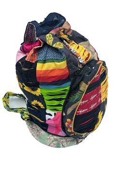 This vibrant and versatile Banjara backpack is a must-have for any adventure. Crafted with colorful patchwork fabric,this handcrafted handbag is a true work of art. The backpack features a spacious main compartment and a smaller front pocket for your essentials. When not in use, the backpack conveniently folds into a compact size for easy storage. Made from durable cotton, this cotton foldable backpack is perfect for travel, festivals, or everyday use. Embrace the bohemian spirit with this uniqu Bohemian Multicolor Backpack For School, Multicolor Rectangular Backpack For Trip, Multicolor Rectangular Backpack For Festivals, Festival Rectangular Multicolor Backpack, Multicolor Rectangular Festival Backpack, Multicolor Backpack With Adjustable Strap For Trip, Multicolor Backpack With Adjustable Strap For Festivals, Bohemian Backpack For Everyday Use, Multicolor Travel Backpack With Pockets