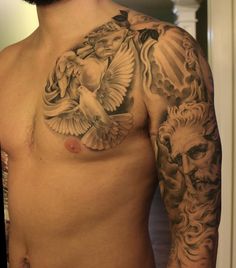 a man with tattoos on his chest and arm