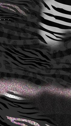 an animal print pattern is shown in black and white with pink glitters on it