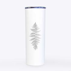 a white travel mug with a fern design on the front and side, sitting against a white background