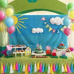 peppa pig birthday party with decorations and balloons