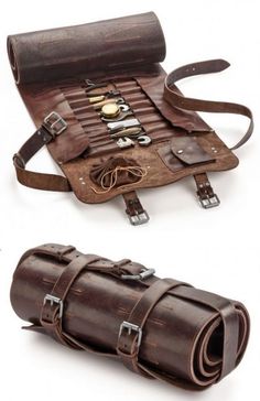 an old leather case with many different items inside and outside the bag is open to reveal its contents