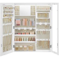 an open closet with jewelry and other items