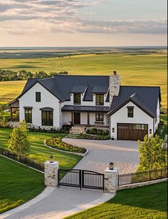 an aerial view of a large home in the country