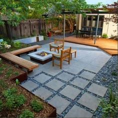 an outdoor patio with wooden furniture and stone steps leading to the back yard, surrounded by greenery