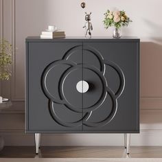 a grey cabinet with an abstract design on it