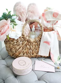 a wicker basket filled with personal care items on a gray chair next to a note