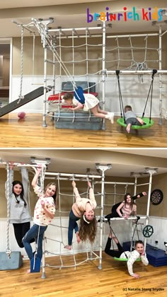 three girls are hanging upside down in a play house made out of metal pipes and wires