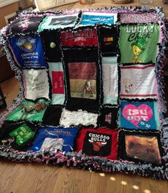 a blanket made out of t - shirts on the floor