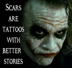 the joker with his face painted white and text reads scars are tattoos with better stories