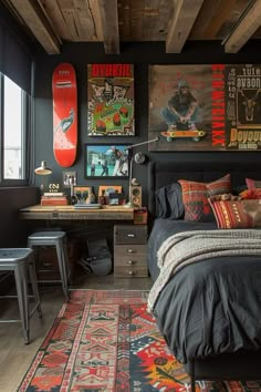 a bedroom with a bed, desk and skateboard on the wall in front of it