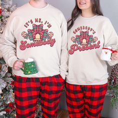 Stay cozy and festive with our Someone's Present Santa Matching Couples Christmas Sweatshirt, the perfect blend of style and holiday cheer! Whether you're snuggling up by the fire or heading out for winter fun, this cute holiday crewneck adds a pop of vintage color to your seasonal wardrobe. Available for boyfriends, husbands, girlfriends, wives, fiancés, or your significant other, it's a heartwarming gift that brings families together during the most magical time of the year. Spread the joy and Couples Matching Xmas Pjs, Cute Couple Christmas Pajamas Holiday, Christmas Couple Sweaters, Couple’s Christmas Pajamas, Couples Christmas Sweaters, Christmas Date, Winter Pullover, Funny Couples, Xmas Holidays