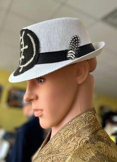 This African Print Fedora is beautiful and unisex. The fedora looks great for the summer with a touch of cowrie shell and feather Comfortable fits small to med size heads.Don't delay order yours today. Casual White Boater Hat With Flat Brim, Casual White Panama Hat With Short Brim, White Adjustable Panama Hat Casual Style, Fitted White Fedora For Kentucky Derby, White Fitted Fedora For Kentucky Derby, White Brimmed Fedora For Kentucky Derby, White Fitted Hat Bands For The Beach, Casual Adjustable White Panama Hat, Casual White Adjustable Panama Hat