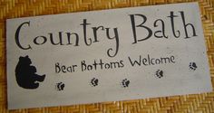 a sign that says country bath bear bottoms welcome