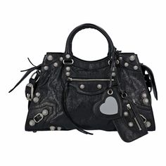 Neo Cagole City Handbag In Black Arena Lambskin, Aged-Silver Hardware With Rhinestones Arena Lambskin, Trapezoidal Shape, Two Leather Hand-Braided Handles, Adjustable And Removable Strap, Aged-Silver Hardware With Rhinestones, Zipped Closure With Knotted Leather Puller, Front Zipped Pocket With Knotted Leather Puller, 1 Inner Zipped Pocket, 1 Removable Zipped Pouch, 1 Removable Heart Mirror, Tone-On-Tone Balenciaga Logo Embossed On Mirror, Cotton Canvas Lining Balenciaga Balenciaga Women Neo Cag Balenciaga Model, Heart Mirror, Balenciaga Women, Balenciaga Logo, Balenciaga Bag, City Bag, Balenciaga City Bag, Lambskin Leather, Balenciaga