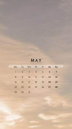 a calendar with the word may on it in front of a cloudy sky and clouds