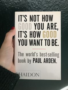 a person holding up a book that says it's not how good you are, it's how good you want to be