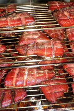 steaks cooking on the grill in an oven