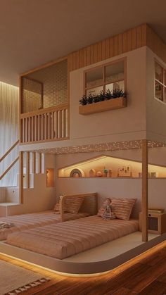 a bed sitting under a window next to a stair case in a room with wooden floors