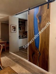 the sliding door is made from wood and has an image of a lake on it