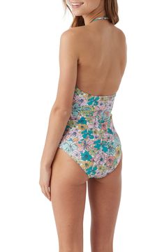 Let her splash and play in this lively printed one-piece styled with a halter neck and airy cutout. Clasps at neck 82% recycled polyamide, 18% elastane Machine wash, dry flat Imported lined gusset Floral Print Halter Neck Tankini For Swimming, Spring Floral Print Backless Swimwear, Tropical Halter Neck Tankini For Spring, Summer Floral Print Halter Neck Tankini, Halter Neck Tankini With Floral Print For Poolside, Beach Party Printed Halter Neck Tankini, Halter Neck Swimwear With Tropical Print, Printed Halter Neck Tankini For Beach Party, Halter Neck Printed Tankini For Beach Party