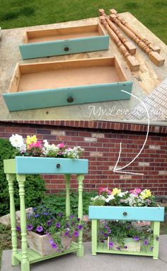 an old drawer turned into a planter with flowers in it and the price is $ 3