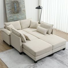 a living room with a large sectional couch