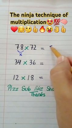 someone is writing on a piece of paper with emoticions in the form of numbers