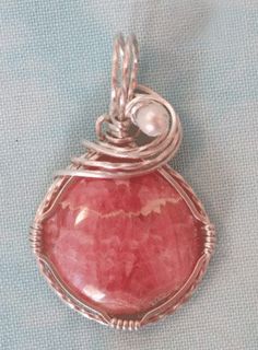 Free Wire Jewelry Tutorials | Gem Profile: Rhodochrosite | Jewelry Making Blog | Information ... Rhodochrosite Jewelry, Wire Wrapped Jewellery, Crochet Metal, Wire Jewelry Making, Black Gold Jewelry, Wire Wrapping Stones, Diy Wire Jewelry, Wire Work Jewelry, Work Jewelry