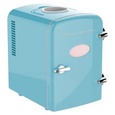 a blue toaster sitting on top of a white table