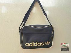 An original vintage Adidas sport bag from the 1980's. An absolute gem for vintage fans. Size:  40 x 30 x15 H x W x D (all dimensions are in cm) Materials: artificial leather, textile, metal condition: The bag is in excellent vintage condition, depending on its age.  The zippers work perfectly. Signs of use. See pictures for details. Shipping: - My shop ships worldwide. - If you like, select the "EXPRESS  shipping" option in the order process to get faster shipping. - You can see the shipping pri Adidas Bag Outfit, Thrift Manifest, Adidas Bag, 00s Aesthetic, Adidas Barricade, Get Faster, Adidas Bags, Vintage Sport, Sports Bags Gym