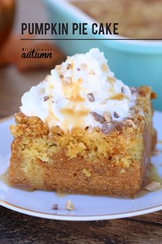 a piece of pumpkin pie on a plate with whipped cream and pecans in the background