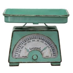 an old fashioned kitchen scale on a white background