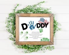 a wooden frame with an american flag and handprinted do - it - yourself sign