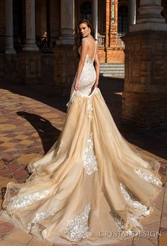 a woman in a wedding dress is standing outside