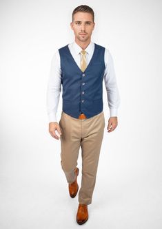 Experience classic styling and modern finesse wearing the Prussian Blue Pinstripe vest. Featuring a vibrant blue hue with subtle pinstripes, this custom made vest will make you feel vibrant and confident. Classic Navy Sleeveless Vest, Fitted Navy Sleeveless Vest, Tailored Pinstripe Sleeveless Vest, Pinstripe Tailored Sleeveless Vest, Tailored Sleeveless Pinstripe Vest, Fitted Pinstripe Vest For Work, Blue Fitted Denim Vest For Work, Blue Fitted Denim Vest For Office, Blue Sleeveless Business Vest