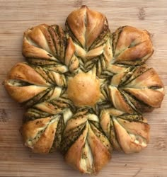 an overhead view of some bread on a wooden table