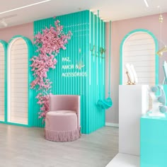 a pink and blue room with flowers on the wall