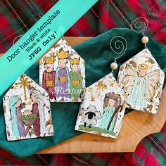 three nativity cards are sitting on a green cloth with the words, do it yourself christmas