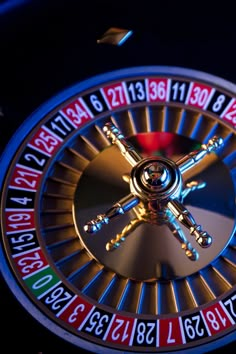 a close up of a casino wheel with numbers on it