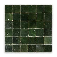 an image of green tiles on the wall