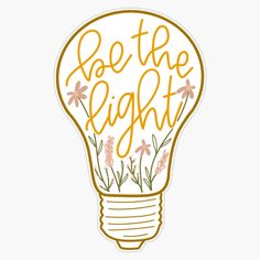 a light bulb sticker with the words be the light on it and flowers inside