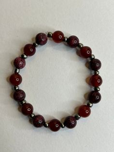 1 dark red bracelet with sliver spacers and beaded with gemstone and glass beads Red Beaded Bracelet, Red Bracelet, Red Bracelets, Red Jewelry, Spring Hill, Black Bracelets, Bracelet Beaded, Red Bead, Jewelry Bracelet