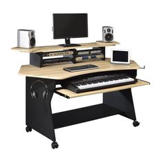 a computer desk with a keyboard, mouse and monitor on it's stand up shelf