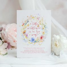 there is a card with flowers on it