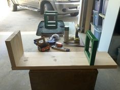 the workbench is being built and ready to be worked on in the garage