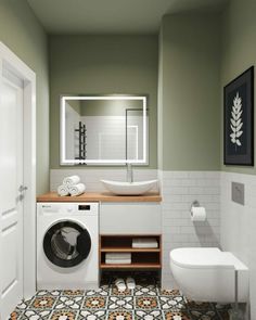 a washer and dryer in a bathroom with tile flooring on the walls