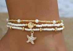 Cute little 3 piece white and gold anklet set with starfish & seashell charms Comes in a sealed branded cellophane pack A personal message can be added if required Cute Beach Accessories, White Starfish Bracelets For Summer, Beachy White Starfish Bracelet, White Starfish Ocean-inspired Bracelet, Ocean-inspired White Bracelets For The Beach, White Ocean-inspired Starfish Bracelets, Cute Anklets, Surf Jewelry, Preppy Bracelets