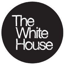 the white house logo with black and white letters on it's bottom right corner