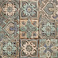 an artistic tile design in blue and green